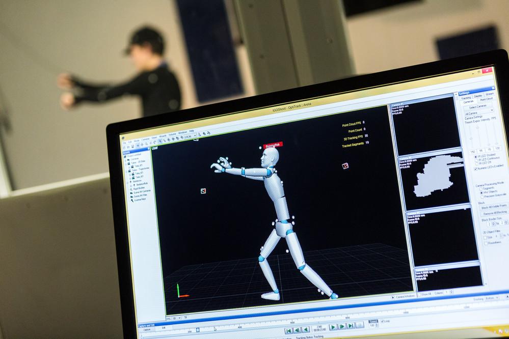 A student tests out motion capture. 